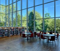 three round white wooden tables